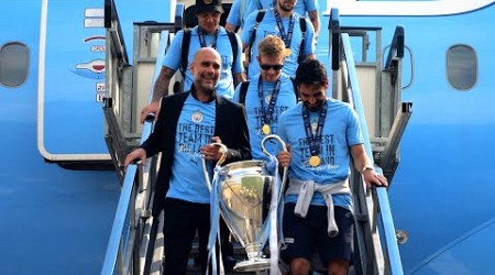 European Champions Manchester City arrive back in UK with Champions League trophy