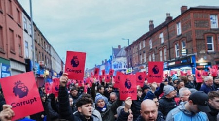 Thousands of Everton fans march to Goodison Park over points deduction – video