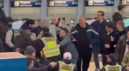 Millwall and Portsmouth fans bump into each other at Waterloo Station