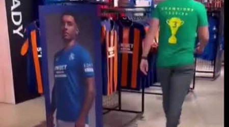 CELTIC FAN WALKS INTO RANGERS STORE | HAVE YOU GOT ANY CHAMPIONS FLAGS?? 