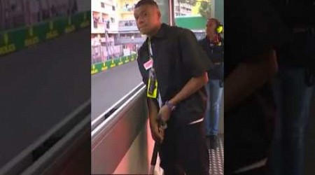 Kylian Mbappé as a flag weaver at Formula 1 Monaco grand prix