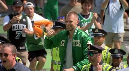 Boston Celtics Kristaps Porzingis arrives at duck boat parade