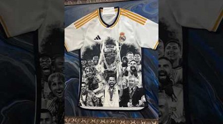 Real Madrid’s squad lifting their 15th Champions League, on a Real Madrid shirt. 