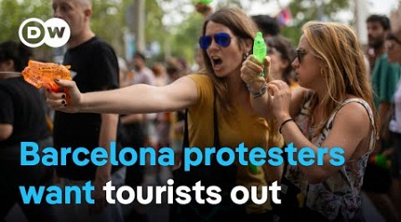 Barcelona: Protesters squirt water pistols at foreigners in attempt to reclaim their city | DW News