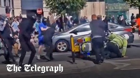 Liverpool clashes: Police officer pushed off motorbike and attacked by far-Right rioters