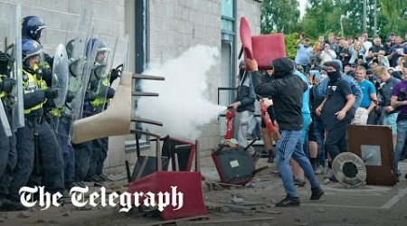 Anti-immigration protesters smash through migrant hotel in Rotherham