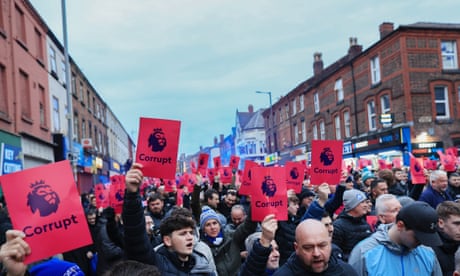 Thousands of Everton fans march to Goodison Park over points deduction – video